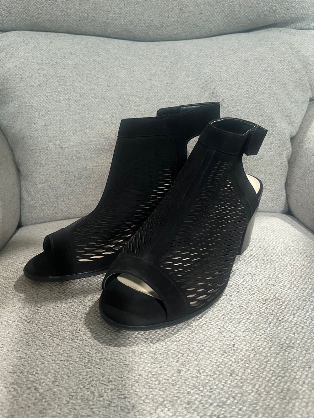 Woman’s Vince Camuto Black leather Laser-Cut Peep-Toe Heels